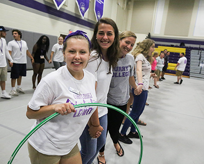 Student look at the camera while having fun in the Katz Gym