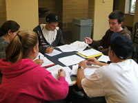 Curry College Students collaborate in a Peer Tutoring Session