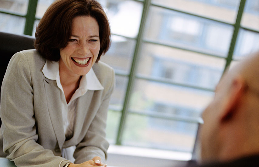 An HR Manager is pictured to represent the SHRM Essentials of HR Management at Curry College