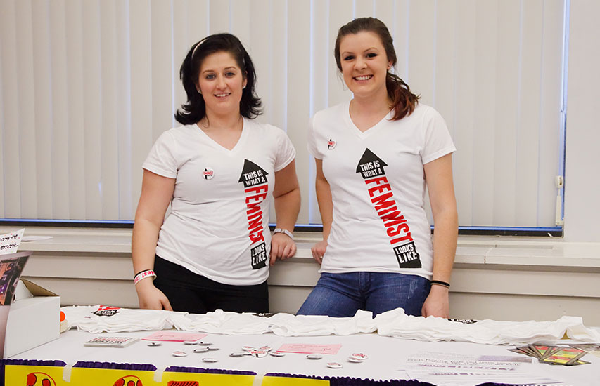 Two women's and gender studies minor students at a Curry College diversity event