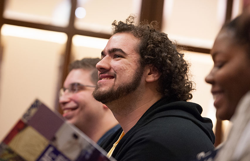 Curry College students listen to a reading in class, representing the British Literary Heritage concentration