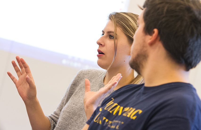Students in the Curry College Honors Program discuss topics in class