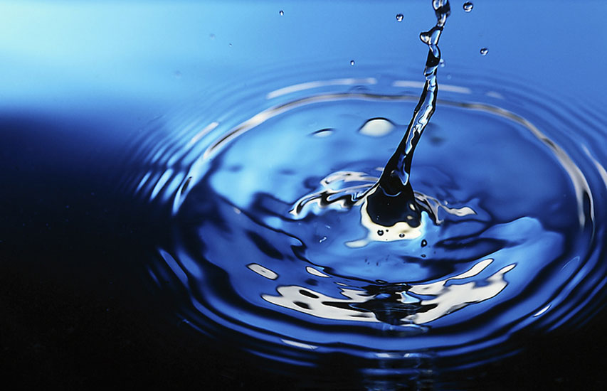 A forzen image of a droplet in water representing the Physics minor at Curry College