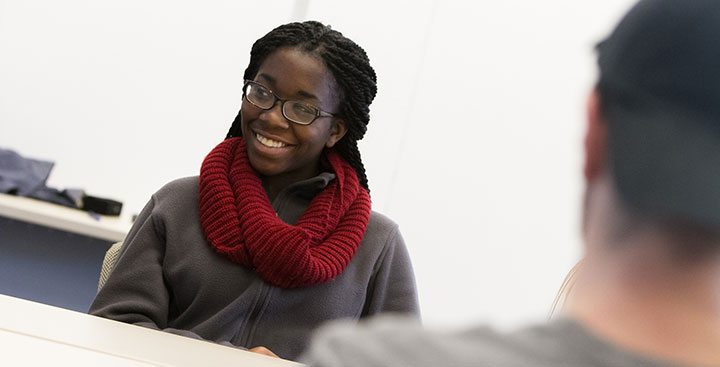 A Curry College student in class