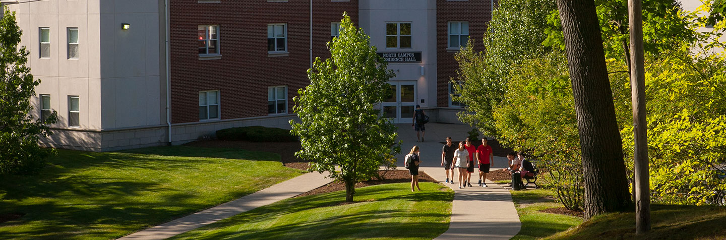 Students hanging out at North Campus Residence Hall at Curry College