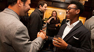 Alumni meet up at the 21 Club in Manhattan for the annual Curry College New York City Reception for alumni, parents, and friends