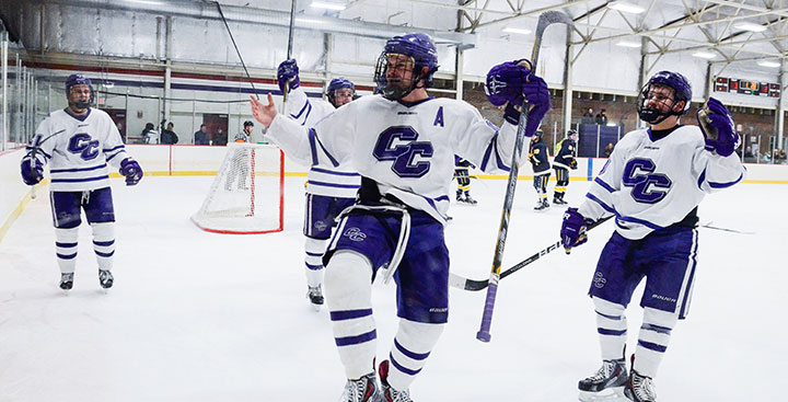 Curry Colonels hockey players celebrate a goal