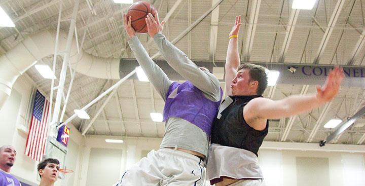 Curry College Intramural bbasketball players compete at the hoop