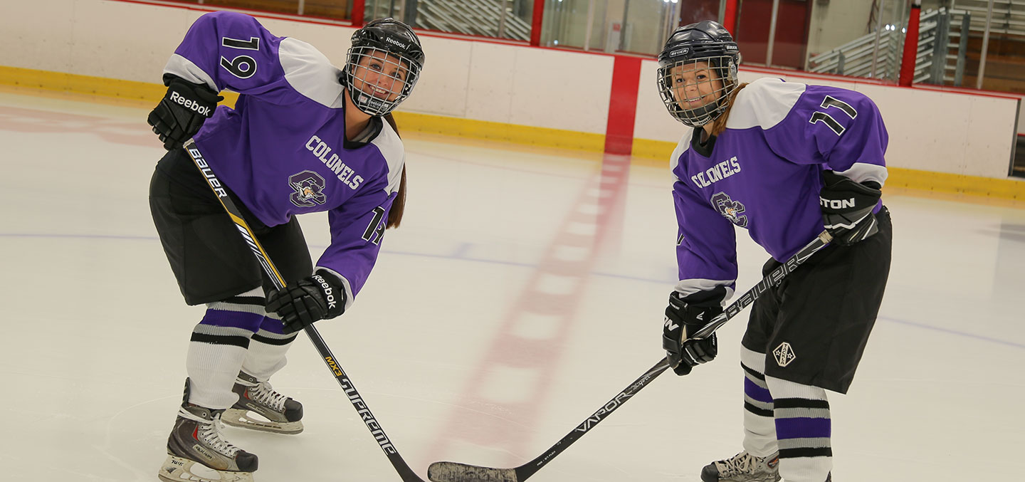 Women's Ice Hockey members on the ice