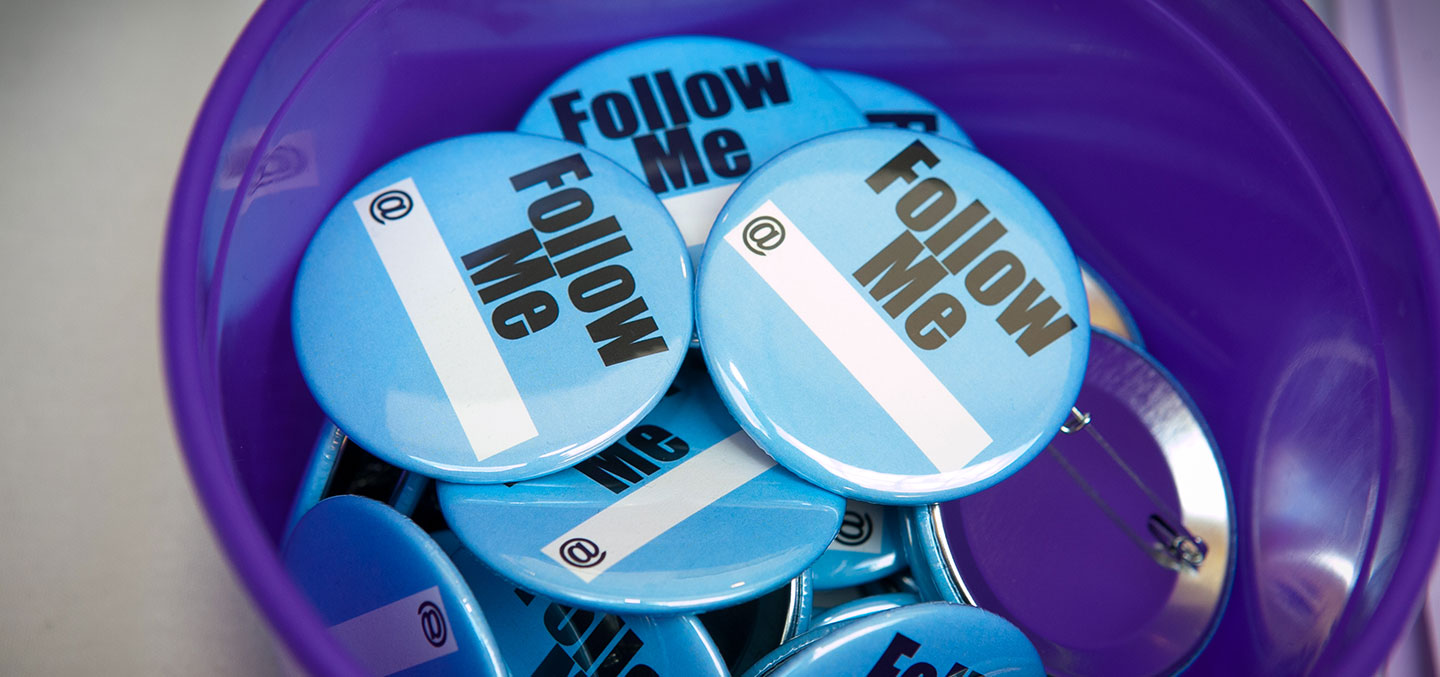 "Follow me" on social media buttons in a purple bucket