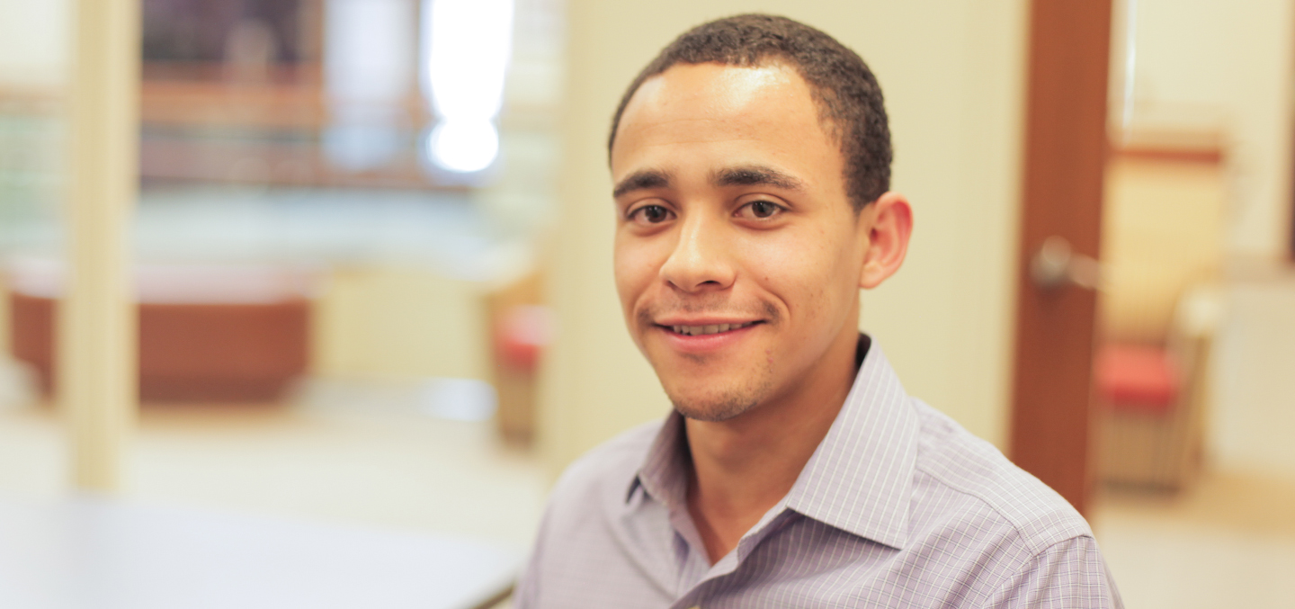 Curry College graduate Moussa Seck '10, MBA '12 